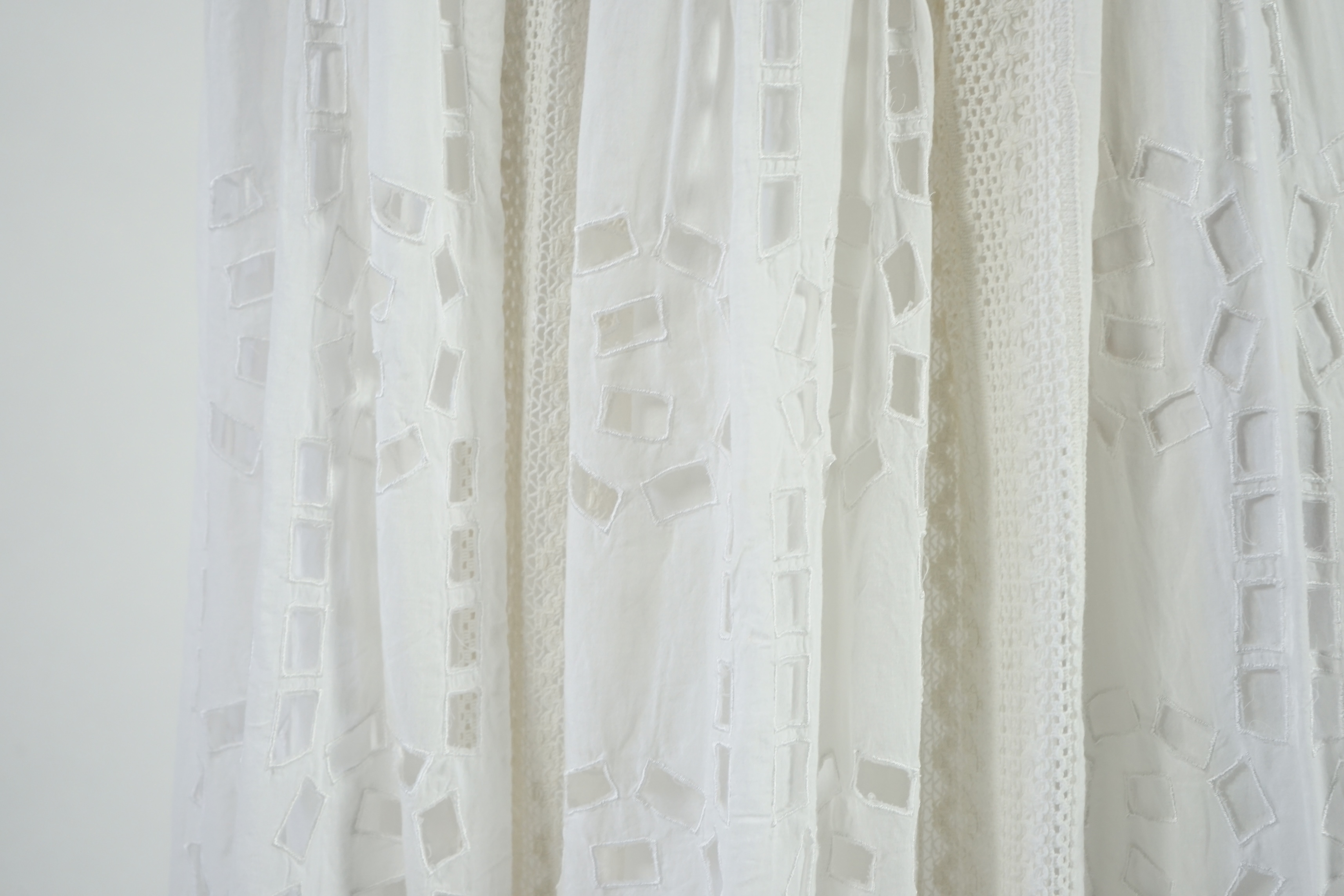 Two Michael Kors white midi length skirts and a white blouse. Size 14 - 16 Proceeds to Happy Paws Puppy Rescue